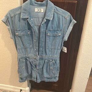 Free people romper! Never worn still has tags. Just didn’t fit me!
